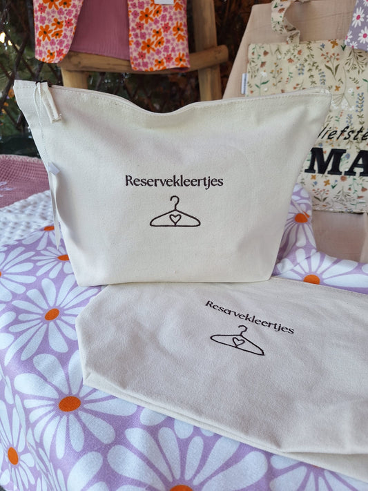 Etui reservekleding met personalisering